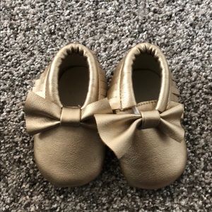 Gold baby moccasins